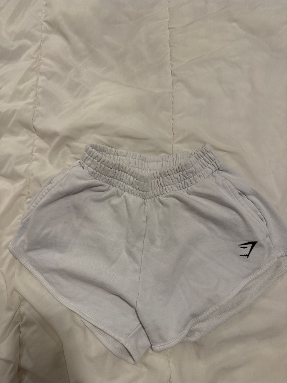 Gymshark Kids White Athletic Shorts with Black Logo